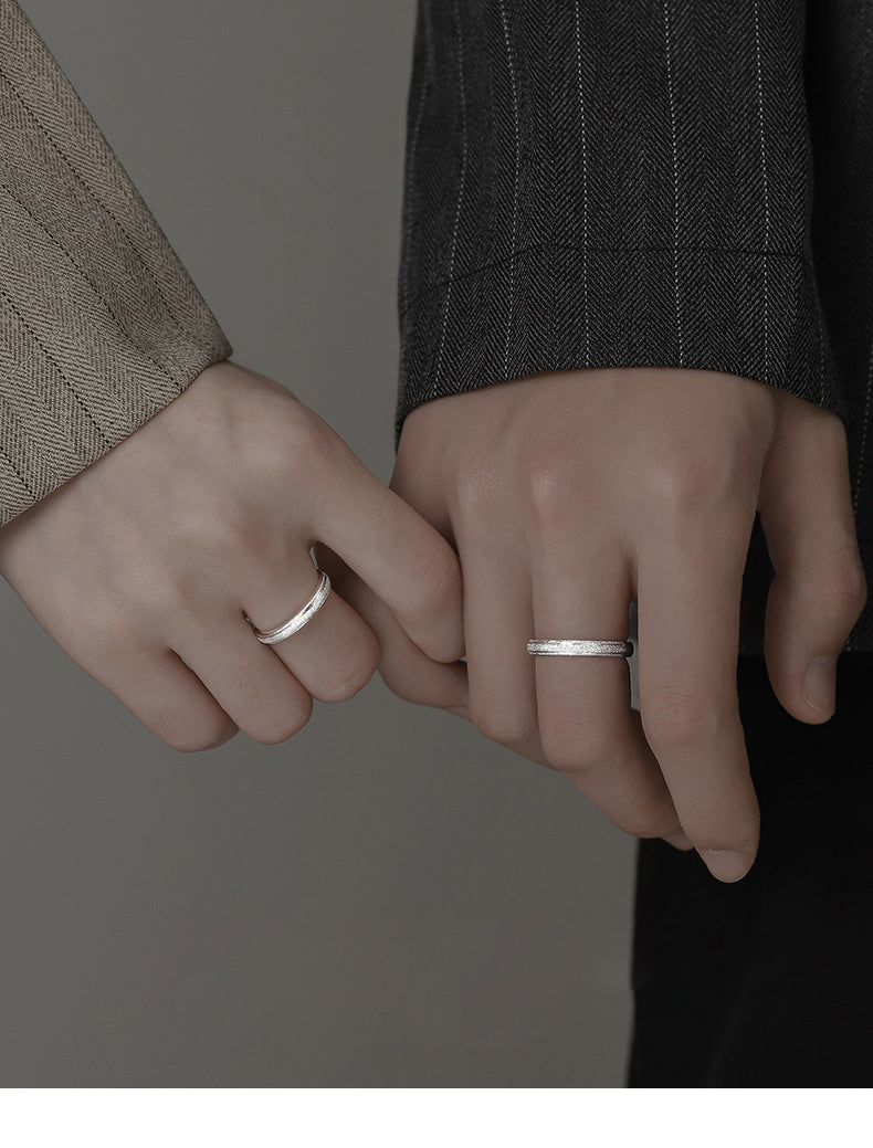 A Pair Of Silver Rings Are Simple